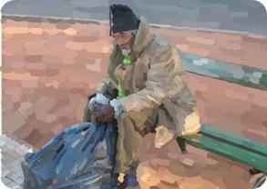 Mendigo en un banco