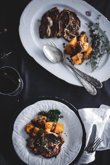 Filetes de Cordero  a la plancha con anchoas y  calabaza asada .