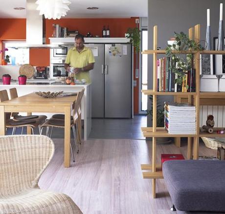 05-man-in-kitchen-orange-walls