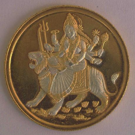 Sathya Sai Baba materializo a un matrimonio amigo una medalla