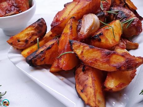 Papas asadas con tomate y romero Papas asadas con tomate y romero