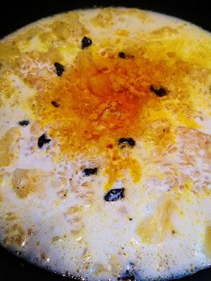 Arroz cremoso con piña y pasas malagueñas.