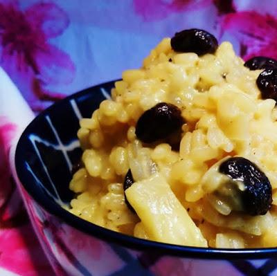 Arroz cremoso con piña y pasas malagueñas.