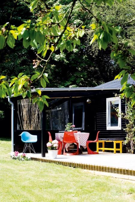 sillas panton sillas eames nevera smeg lámpara Nelson´s Bubble lámpara de diseño estilo nórdico estilo escandinavo estilo danés Eames eiffel decoración naraja decoración en blanco cocina negra cocina moderna cocina blanca casa de verano dinamarca 