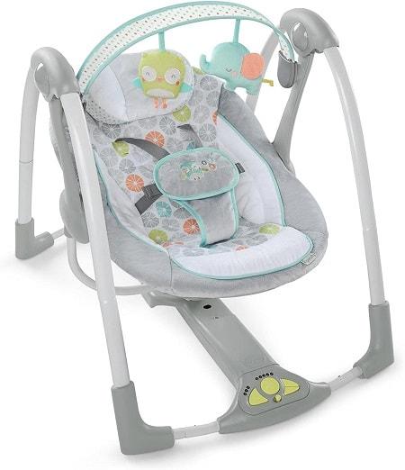 columpio de bebe con musica y arco de juegos