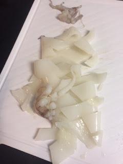 CALAMARES ENCEBOLLADOS