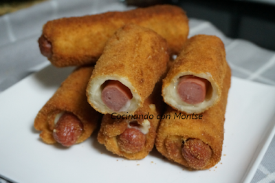 Rollitos de salchichas y queso con pan de molde