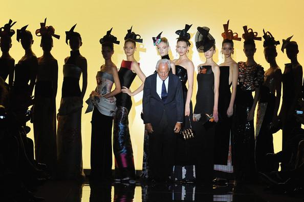 Giorgio Armani poses with models on the runway during the Giorgio Armani Prive Haute Couture Fall/Winter 2011/2012 show as part of Paris Fashion Week at Palais de Chaillot on July 5, 2011 in Paris, France.
