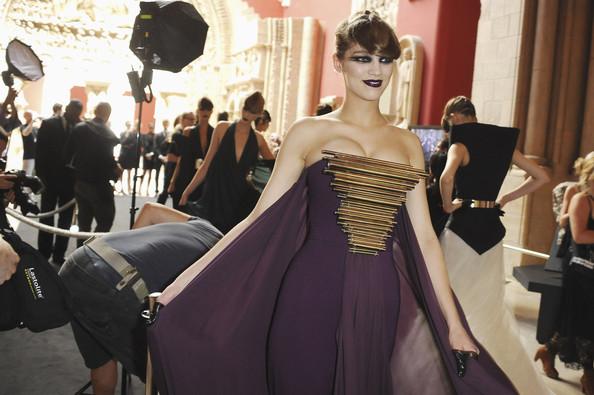 A model prepares backstage during the Stephane Rolland Haute Couture Fall/Winter 2011/2012 show as part of Paris Fashion Week at Cite de l'Architecture et du Patrimoine on July 5, 2011 in Paris, France.