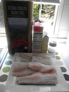 Lomos de merluza con gambas al vino blanco