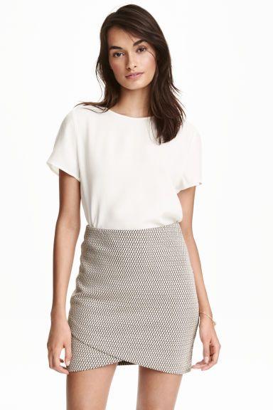 Pegadas Faldas Cortas Cruzadas