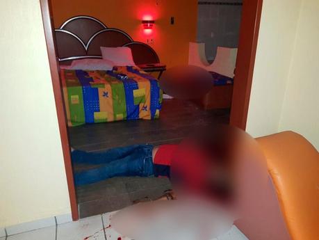 Ejecutan a dos hombres en motel del Anillo Periférico
