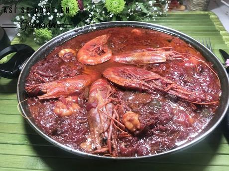 Arroz rojo con carabineros