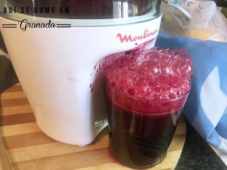 Arroz rojo con carabineros