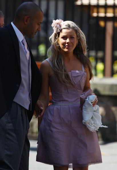 Guests arrive for the Royal wedding of Zara Phillips and Mike Tindall at Canongate Kirk on July 30, 2011 in Edinburgh, Scotland. The Queen's granddaughter Zara Phillips will marry England rugby player Mike Tindall today at Canongate Kirk. Many royals are expected to attend including the Duke and Duchess of Cambridge.