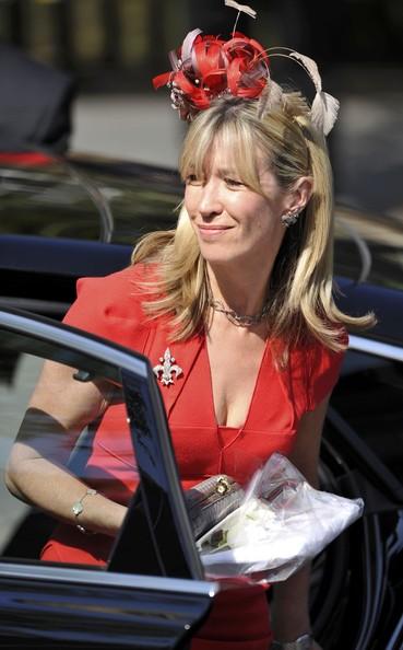 A guest arrives to the Royal wedding of Zara Phillips and Mike Tindall at Canongate Kirk on July 30, 2011 in Edinburgh, Scotland. The Queen's granddaughter Zara Phillips will marry England rugby player Mike Tindall today at Canongate Kirk. Many royals are expected to attend including the Duke and Duchess of Cambridge.