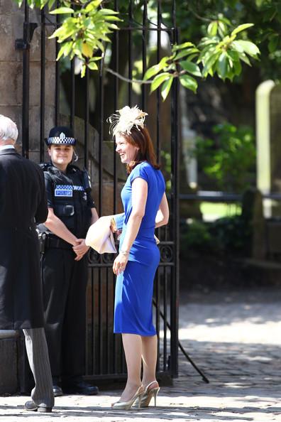 Guests depart from the Royal wedding of Zara Phillips and Mike Tindall at Canongate Kirk on July 30, 2011 in Edinburgh, Scotland. The Queen's granddaughter Zara Phillips will marry England rugby player Mike Tindall today at Canongate Kirk. Many royals are expected to attend including the Duke and Duchess of Cambridge.