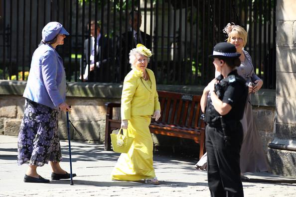 Guests arrive for the Royal wedding of Zara Phillips and Mike Tindall at Canongate Kirk on July 30, 2011 in Edinburgh, Scotland. The Queen's granddaughter Zara Phillips will marry England rugby player Mike Tindall today at Canongate Kirk. Many royals are expected to attend including the Duke and Duchess of Cambridge.