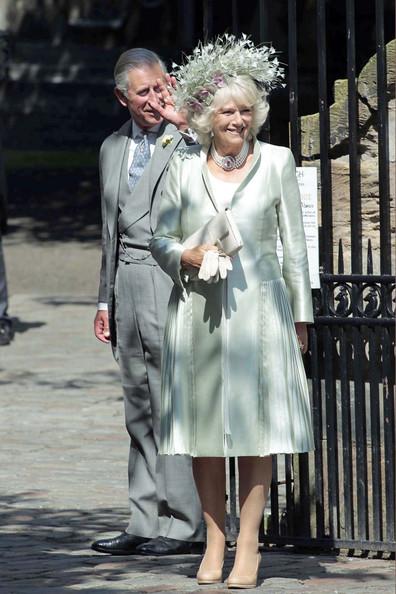 Prince Charles and Camilla, Duchess of Cornwall, arrive at Edinburgh's historic Canongate Kirk for the wedding of his niece Zara Phillips and Mike Tindall.
