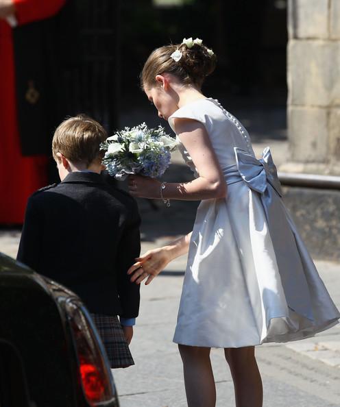 A flower girl and page boy arrive for the Royal wedding of Zara Phillips and Mike Tindall at Canongate Kirk on July 30, 2011 in Edinburgh, Scotland. The Queen's granddaughter Zara Phillips will marry England rugby player Mike Tindall today at Canongate Kirk. Many royals are expected to attend including the Duke and Duchess of Cambridge.