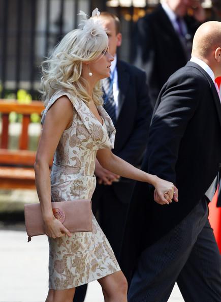 Guests arrive for the Royal wedding of Zara Phillips and Mike Tindall at Canongate Kirk on July 30, 2011 in Edinburgh, Scotland. The Queen's granddaughter Zara Phillips will marry England rugby player Mike Tindall today at Canongate Kirk. Many royals are expected to attend including the Duke and Duchess of Cambridge.