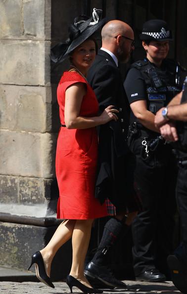 Guests arrive for the Royal wedding of Zara Phillips and Mike Tindall at Canongate Kirk on July 30, 2011 in Edinburgh, Scotland. The Queen's granddaughter Zara Phillips will marry England rugby player Mike Tindall today at Canongate Kirk. Many royals are expected to attend including the Duke and Duchess of Cambridge.