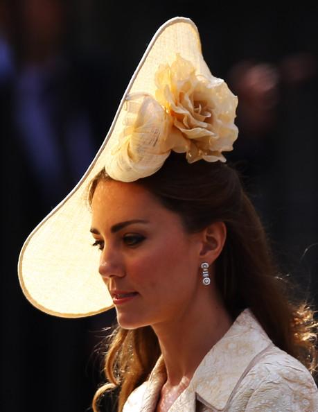 EDINBURGH, SCOTLAND - JULY 30.Catherine, Duchess of Cambridge depart after the Royal wedding of Zara Phillips and Mike Tindall at Canongate Kirk on July 30, 2011 in Edinburgh, Scotland. The Queen's granddaughter Zara Phillips will marry England rugby player Mike Tindall today at Canongate Kirk. Many royals are expected to attend including the Duke and Duchess of Cambridge.