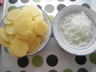 Guiso de calamares con pasas y piñones