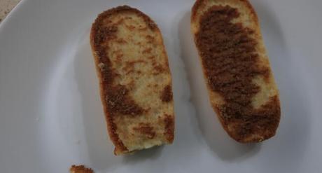 Pastelito de Coco con Crema Pastelera Thermomix ® Bizcochitos de soletilla partidos a la mitad