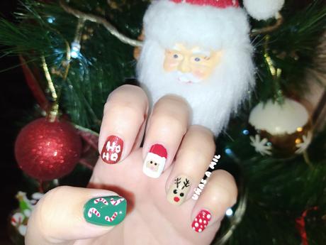 Diseño de uñas de Papa Noel para Nochebuena y Navidad
