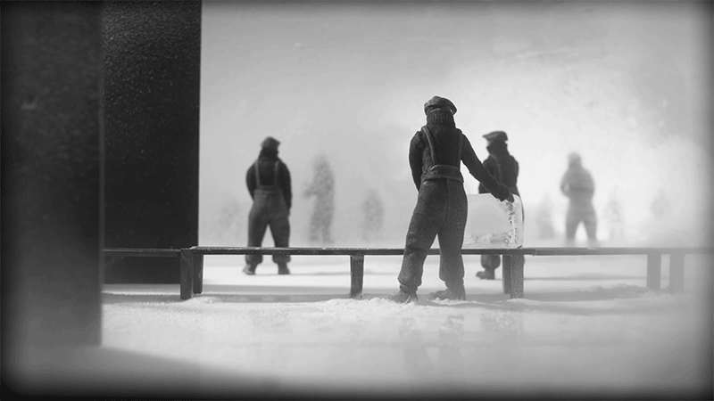 Cine en miniatura dentro de un cubo de hielo Cine en miniatura dentro de un cubo de hielo