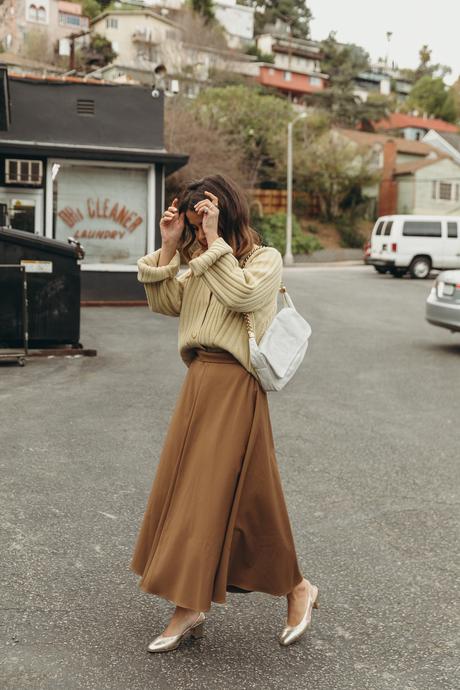 Laundry day wearing cozy cardigan, midi skirt, golden Chanel shoes and Chanel vintage bag