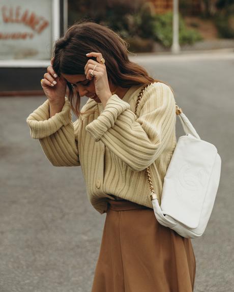 Laundry day wearing cozy cardigan, midi skirt, golden Chanel shoes and Chanel vintage bag