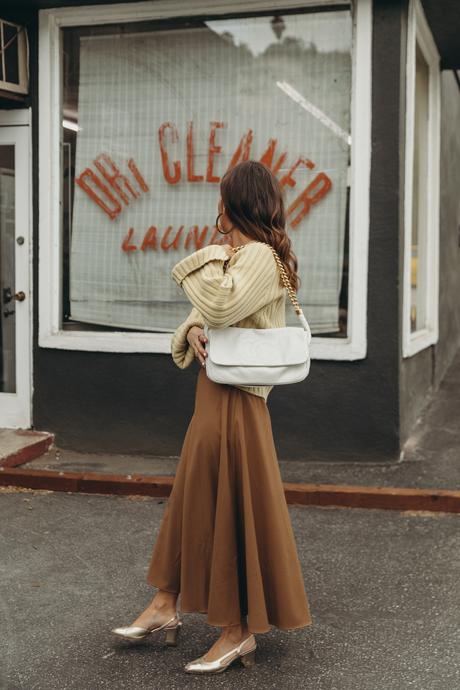 Laundry day wearing cozy cardigan, midi skirt, golden Chanel shoes and Chanel vintage bag