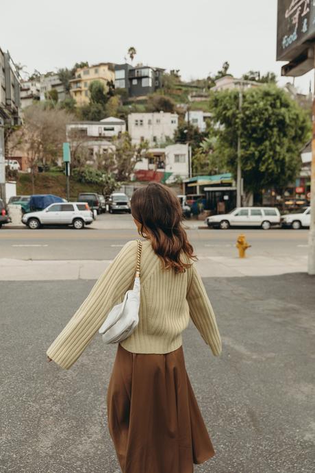 Laundry day wearing cozy cardigan, midi skirt, golden Chanel shoes and Chanel vintage bag