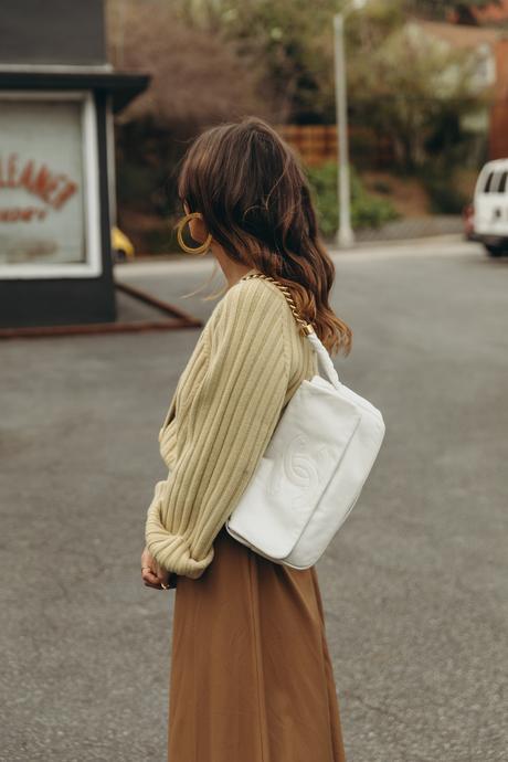 Laundry day wearing cozy cardigan, midi skirt, golden Chanel shoes and Chanel vintage bag