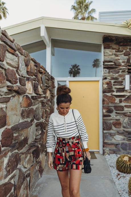 Sara from Collage Vintage wearing Sézane jacquard multicolor shorts and striped jumper and Chanel dad leather sandals