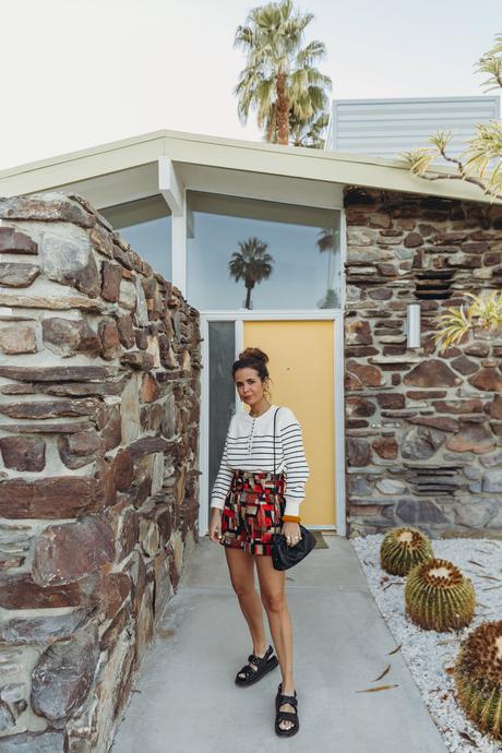 Sara from Collage Vintage wearing Sézane jacquard multicolor shorts and striped jumper and Chanel dad leather sandals