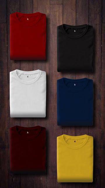 Camisetas dobladas de distintos colores