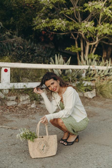 Sara from Collage Vintage wearing a Rouje spring dress, basket bag and high-heels sandals