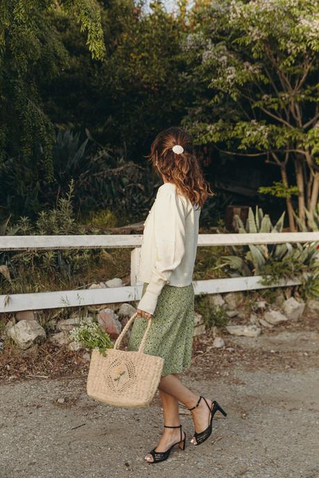 Sara from Collage Vintage wearing a Rouje spring dress, basket bag and high-heels sandals