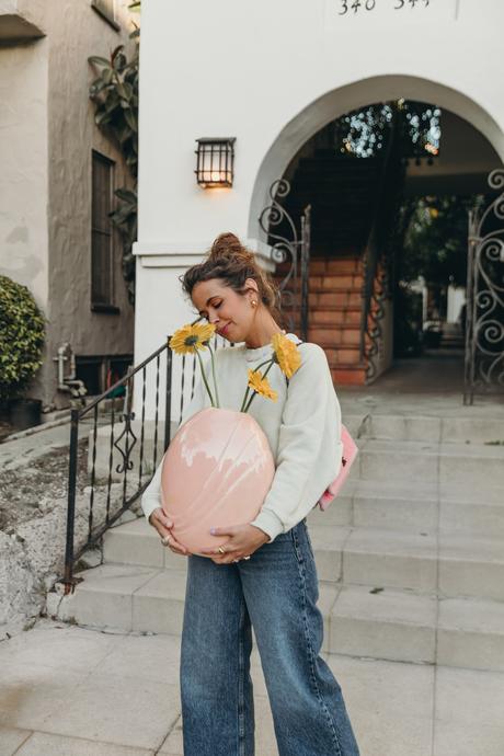 Sara from Collage Vintage wearing H&M sweatshirt, Zara cropped wide-leg jeans and Chanel vintage bag