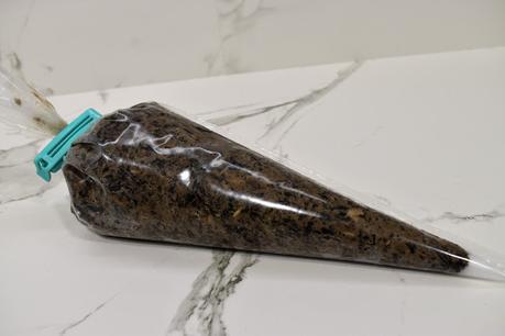 Canelones de carne con trompetas de la muerte y mousse de pato