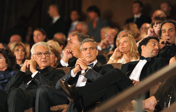 (L-R) Venice Film Festival President Paolo Baratta, director/writer/actor George Clooney and writer Grant Heslov attend the Opening Ceremony of the 68th Venice Film Festival at the Palazzo del Cinema on August 31, 2011 in Venice, Italy.