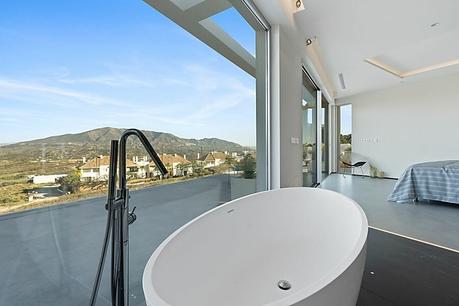 delikatissen villa lujo costa del sol terrace with jacuzzi and amazing views nueva construcción malaga newly built villa costa del sol modern interiors luxurious home house with social areas house with private pool electric car station contemporary interiors bedroom with ensuite bathroom delikatissen villa lujo costa del sol terrace with jacuzzi and amazing views nueva construcción malaga newly built villa costa del sol modern interiors luxurious home house with social areas house with private pool electric car station contemporary interiors bedroom with ensuite bathroom