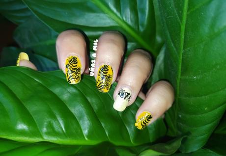 Manicura en amarillo con hojas Manicura en amarillo con hojas
