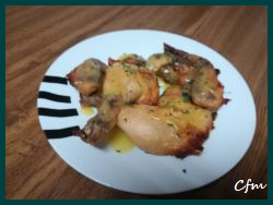 Muslos y alitas de pollo con naranja