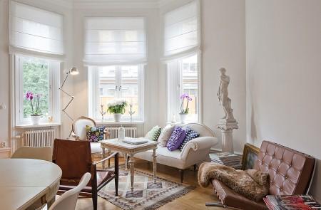 Mezclando estilos vintage swan arne jacobsen sofá gris moderno sillón y otoman barcelona sillas tulip blanco sillas eames en amarillo silla kartell transparente silla 7 con brazos muebles reciclados muebles de diseño mezcla de estilos en decoración mesa estilo francés mecedora kartell mesita blanca estilo ecléctico espejo barroco electrodomesticos metal eames rocking chair decoración de interiores cuadros indios americanos cocina moderna cocina blanca antigüedades