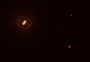 Obtienen la imagen de un planeta orbitando del par de estrellas más masivo observado hasta la fecha
