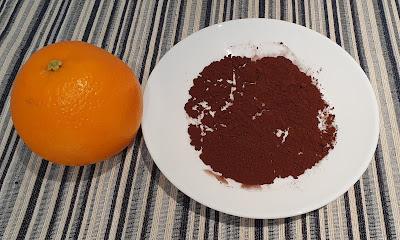 Cacao en polvo y naranja para ralladura